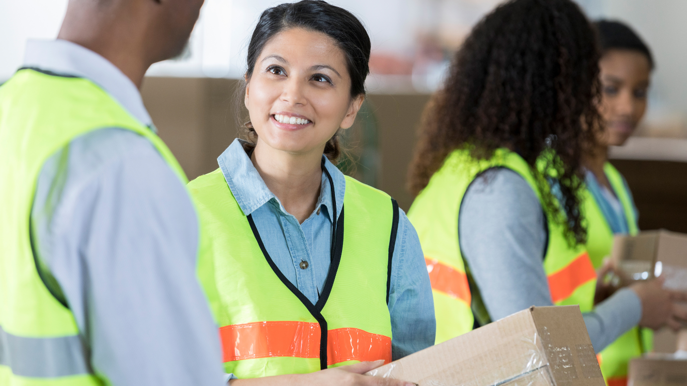 stock photos of employees with reflective vests
