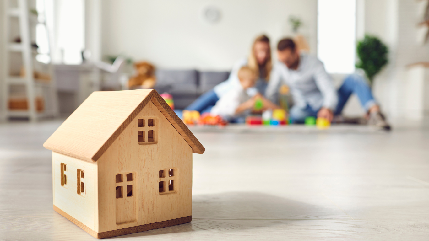 family stock photo with wooden block of home